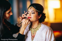Beautiful indian bride being dolled up for her ceremony Beautiful indian bride being dolled up for her ceremony