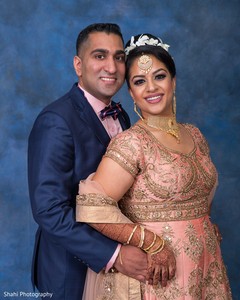 Elegant Indian bride and groom's wedding reception fashion. indian bride and groom,indian wedding fashion,indian bride jewelry,indian wedding hair and makeup