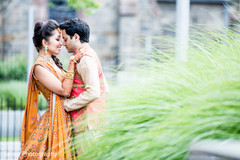 Gorgeous Indian bride and groom in mehndi traditional outfits. Gorgeous Indian bride and groom in mehndi traditional outfits.