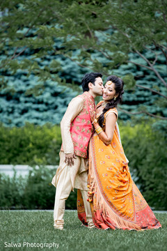 Sweet shot of Indian couple kissing outdoors. Sweet shot of Indian couple kissing outdoors.