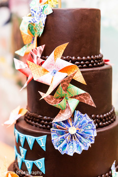 Indian pre-wedding celebration cake windmill decor. Indian pre-wedding celebration cake windmill decor.