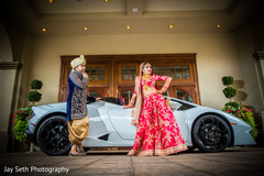 Ravishing Indian bride posing outdoors with groom. indian wedding ceremony fashion,indian bride and groom,indian wedding traditional outfits