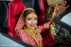 Lovely capture of Indian bride holding grooms hand. indian bride,indian wedding fashion,indian bride hair and makeup,indian bride jewelry