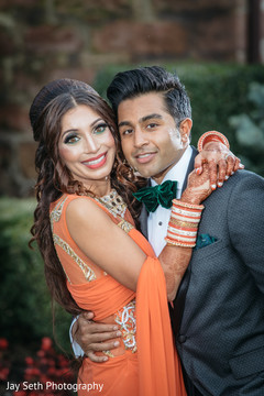 Lovely Indian couple posing outdoors with their reception fashion. indian wedding fashion,indian bride and groom,indian bride hair and makeup