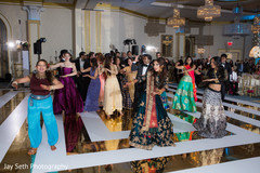 Joyful Indian wedding reception dance performance. indian bride and groom,indian wedding reception fashion,indian wedding dance