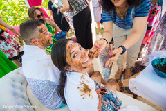 Traditional indian bride and groom's haldi ritual indian wedding gallery,indian bride and groom,pre-wedding celebrations,haldi ceremony