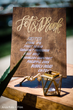 Gorgeous Indian wedding wooden drinks menu. Gorgeous Indian wedding wooden drinks menu.