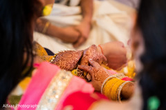 Indian bride during pre-wedding ritual Indian bride during pre-wedding ritual