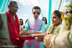 Indian couple at their wedding ceremony. indian wedding ceremony,indian wedding ceremony photography,indian bride and groom