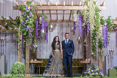 Indian lovebirds posing for photo shoot indian wedding fashion,indian bride and groom,indian bride hair and makeup,mandap