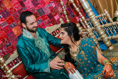 Indian bride and groom looking at each other portrait.