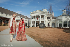 Joyful Indian bride and groom holding hands capture. indian wedding ceremony fashion,indian bride and groom,indian wedding traditional outfits