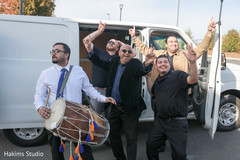 Indian baraats dhol drum player ready for ritual.