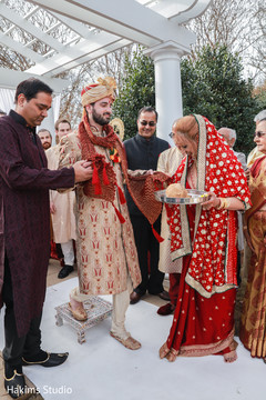 Indian groom  at the baraat ritual photo.