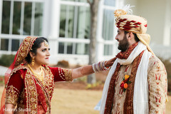 Lovely Indian bride and groom outdoors capture.