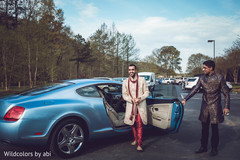 Indian groom next to wedding car Indian groom next to wedding car