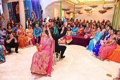 Indian bride and groom at their sangeet celebrations portrait. indian bride and groom,indian bride hair and makeup,sangeet,indian pre-wedding fashion