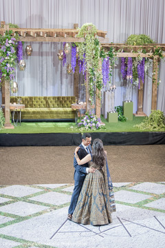 Elegant Indian bride and groom first dance portrait. indian wedding cake,indian bride and groom,indian wedding fashion