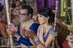Joyful Indian bride and groom at their pre-wedding celebration capture. Joyful Indian bride and groom at their pre-wedding celebration capture.