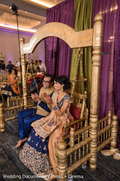 Indian bride and groom on their garba mandap capture. Indian bride and groom on their garba mandap capture.