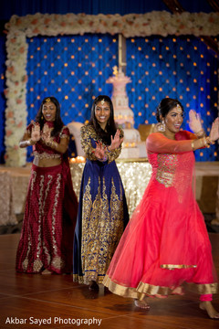 Indian wedding guests showing some dance moves. indian wedding reception fashion,indian wedding dance,bollywood dancers