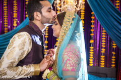 Cute indian groom kissing bride's forehead indian wedding gallery,indian bride and groom,gaye holud,indian bridesmaids