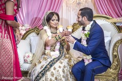 Indian lovebirds having a drink indian wedding reception,indian wedding reception photography,indian bride and groom