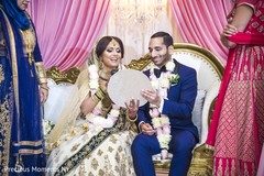 Indian lovebirds fun moment indian wedding reception,indian wedding reception photography,indian bride and groom