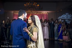 Indian lovebirds having their first dance. indian wedding reception,indian wedding reception photography,indian bride and groom
