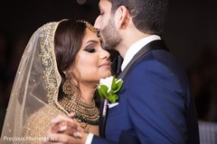Sweet indian couple having their first dance indian wedding reception,indian wedding reception photography,indian bride and groom