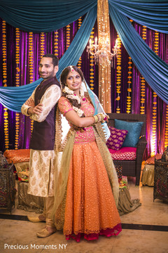 Cute indian bride and groom's portrait pre- wedding celebrations,gaye holud,indian bride and groom