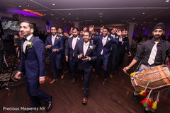 Upbeat indian groom's entrance with groomsmen indian wedding reception,indian wedding reception photography,indian groom