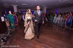 Enchanting indian bride making her entrance indian wedding reception,indian wedding reception photography,indian bride