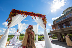 Lovely indian couple under the mandap mandap,indian wedding