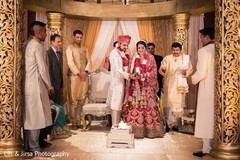 When the bride and groom take hands to hold a coconut. When the bride and groom take hands to hold a coconut.