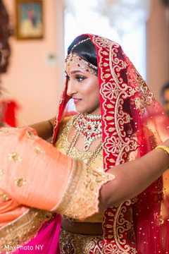 Beautiful indian bride being dolled up for her ceremony Beautiful indian bride being dolled up for her ceremony
