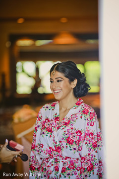 Joyful Indian bride with her makeup done capture. Joyful Indian bride with her makeup done capture.