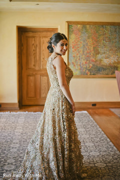 Indian bride's golden embroidered anarkali dress. Indian bride's golden embroidered anarkali dress.
