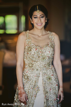 Indian bride glowing in her wedding attire. Indian bride glowing in her wedding attire.