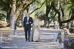 Joyful Indian bride walking in to wedding ceremony. Joyful Indian bride walking in to wedding ceremony.