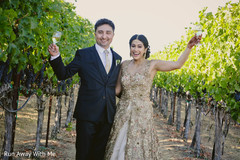 Indian the bride and groom having cheers capture. Indian the bride and groom having cheers capture.