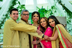Indian bride posing with her family members photo. Indian bride posing with her family members photo.