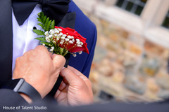 Indian groom getting his Boutonniere on. Indian groom getting his Boutonniere on.