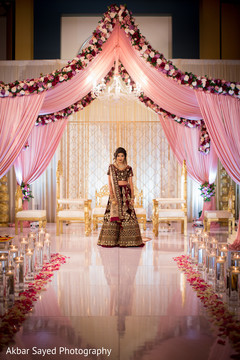 Indian bride glowing in her wedding attire. Indian bride glowing in her wedding attire.