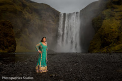 Lovely Indian wife posing on her turquoise color Anarkali. Lovely Indian wife posing on her turquoise color Anarkali.