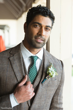 Elegant indian groom in a classic suit Elegant indian groom in a classic suit