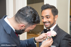 Indian groom getting ready scene Indian groom getting ready scene