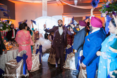 Indian groom dancing during entrance Indian groom dancing during entrance