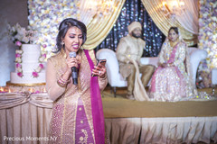 Sweet Indian bridesmaid giving out a speech for bride and groom. Sweet Indian bridesmaid giving out a speech for bride and groom.