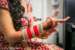 Indian bride getting ready putting her bangles on. Indian bride getting ready putting her bangles on.